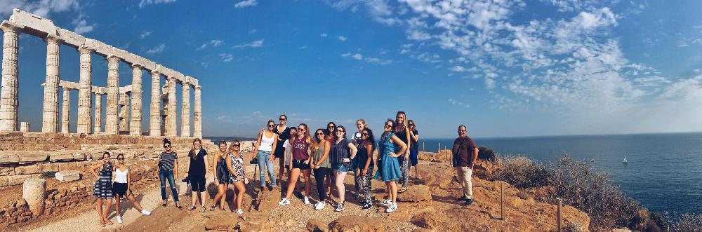 Students in Greece with ruins